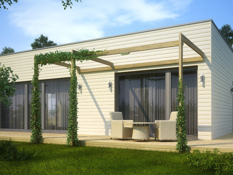 Building Exterior Cladded in Beige Vinyl Siding