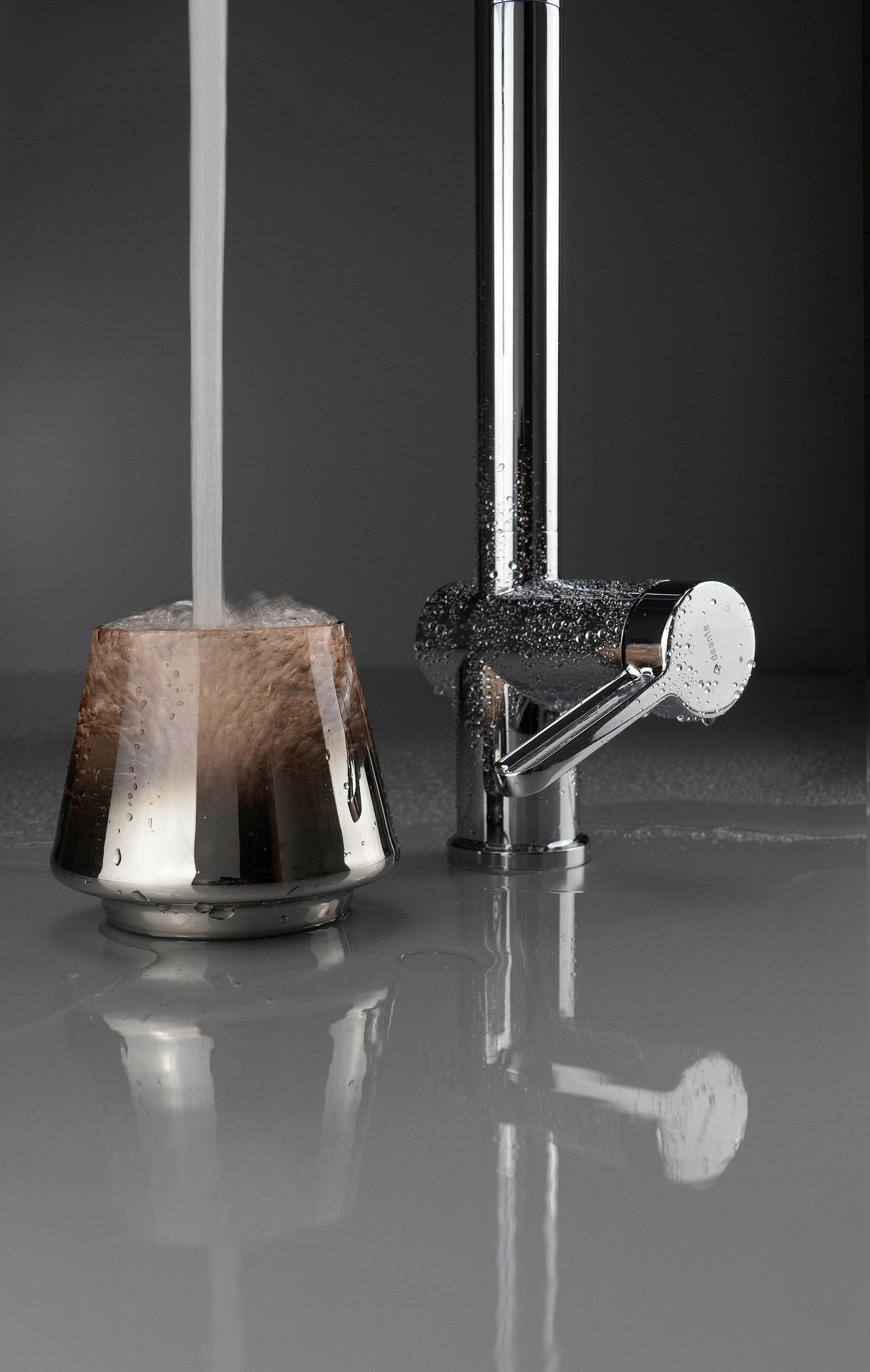 Kitchen tap, with water filter connection, with elastic spout